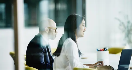 People in profile in a meeting