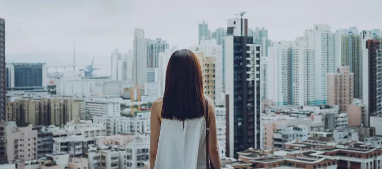 Woman looking at a city