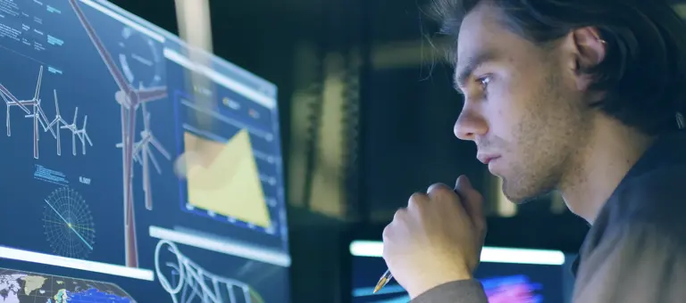 man looking at computer