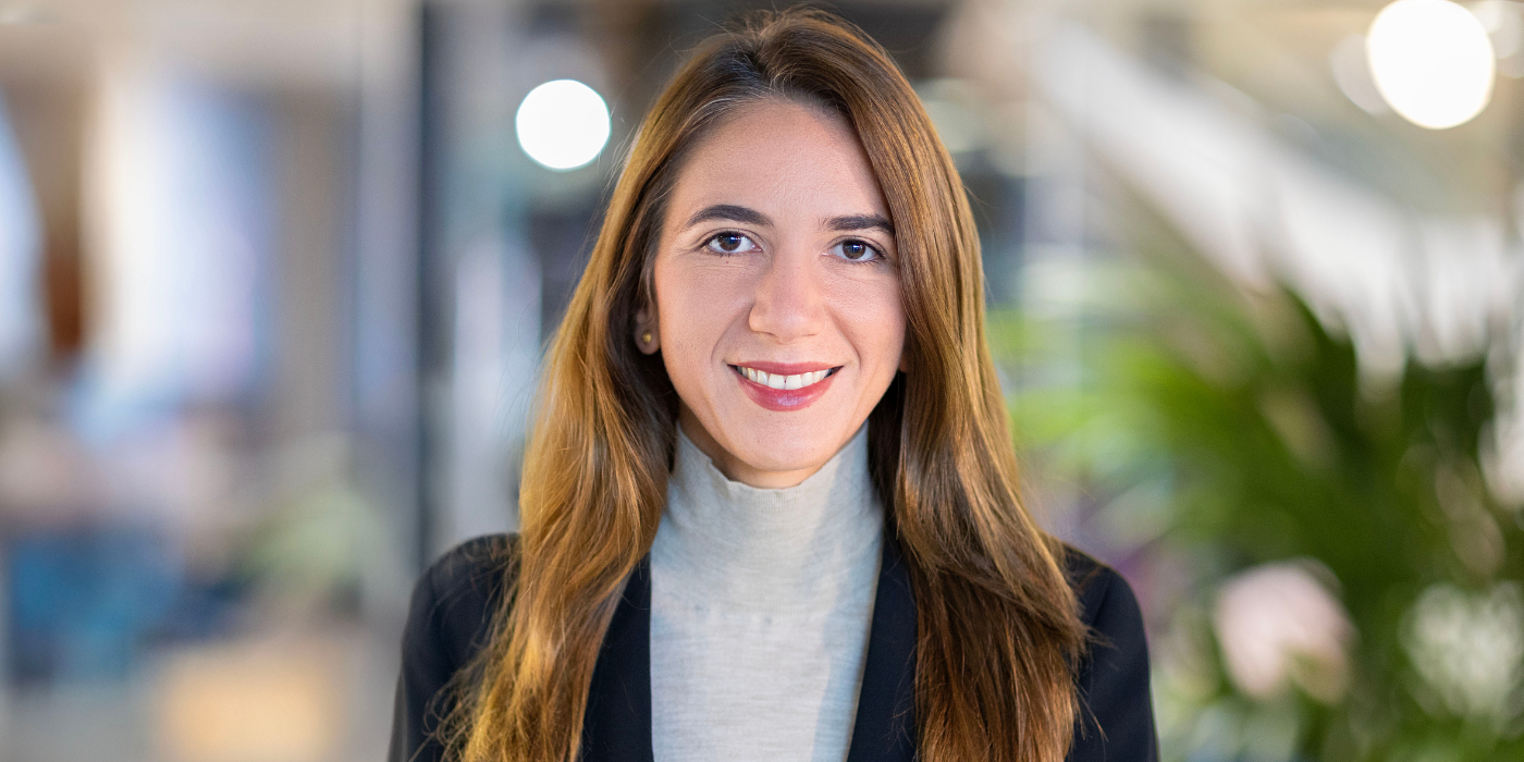 A professional headshot of Juana Tabaza