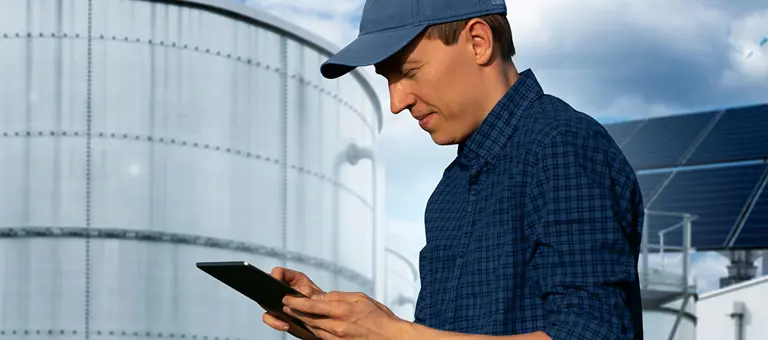 Worker looking at a tablet