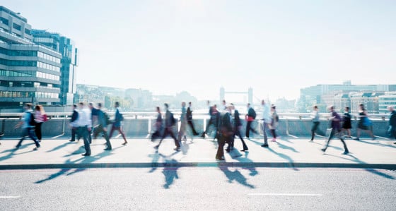 People crossing London Bridge