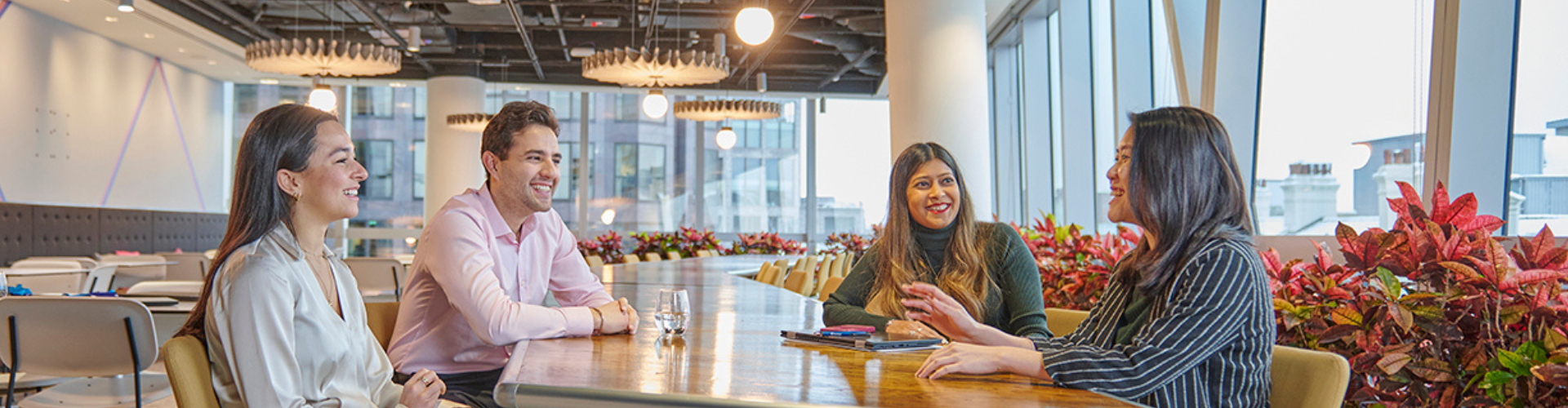 People sat around boardroom table
