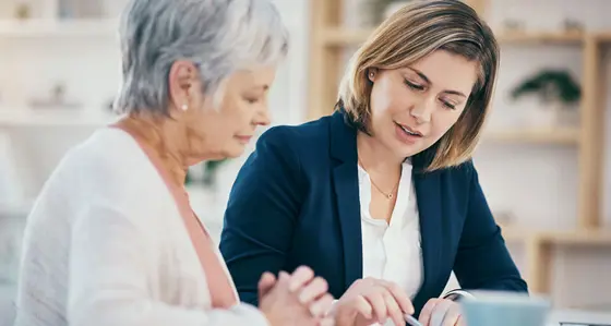 Two women engaged in a serious conversation