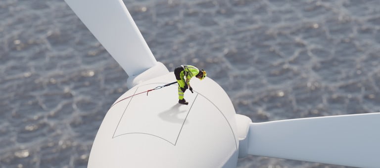 Engineer standing on an offshore wind turbine