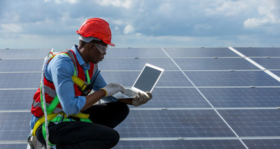 Engineer working on a solar panel