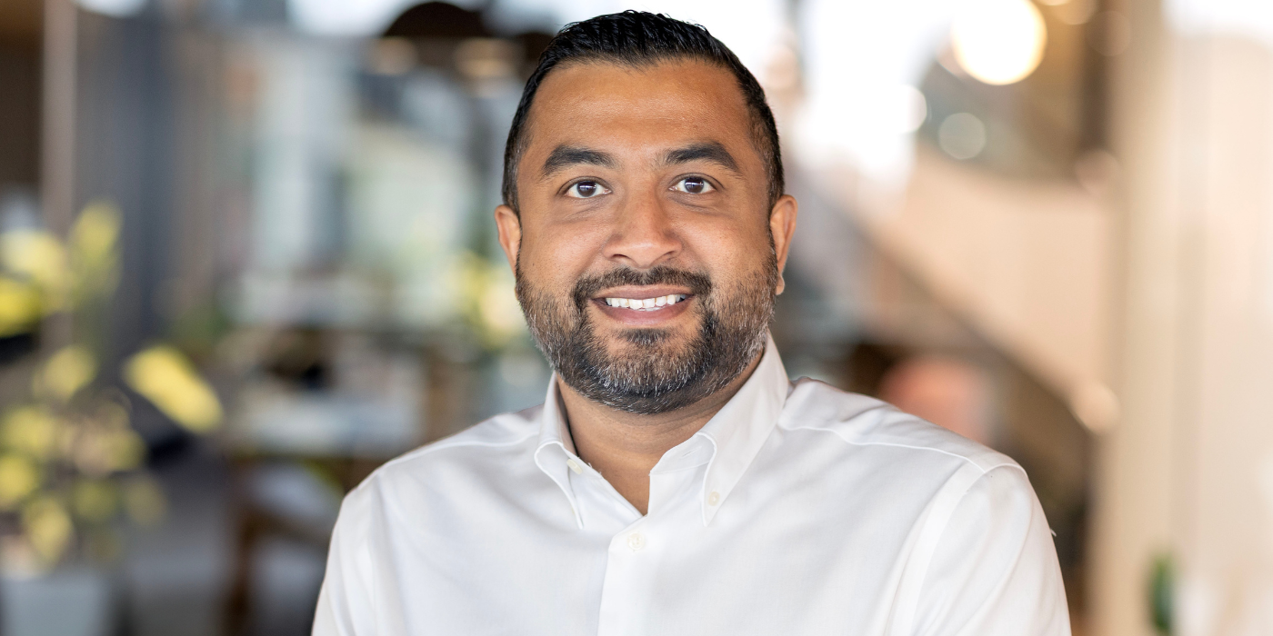 A professional headshot of Hitesh Parmar