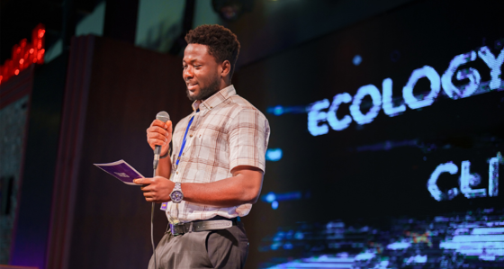 Expert giving a speech at a conference