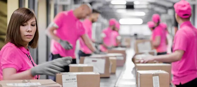 Workers in a logistics facility