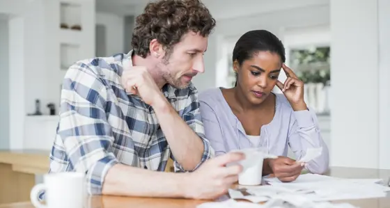Couple looking at their bills