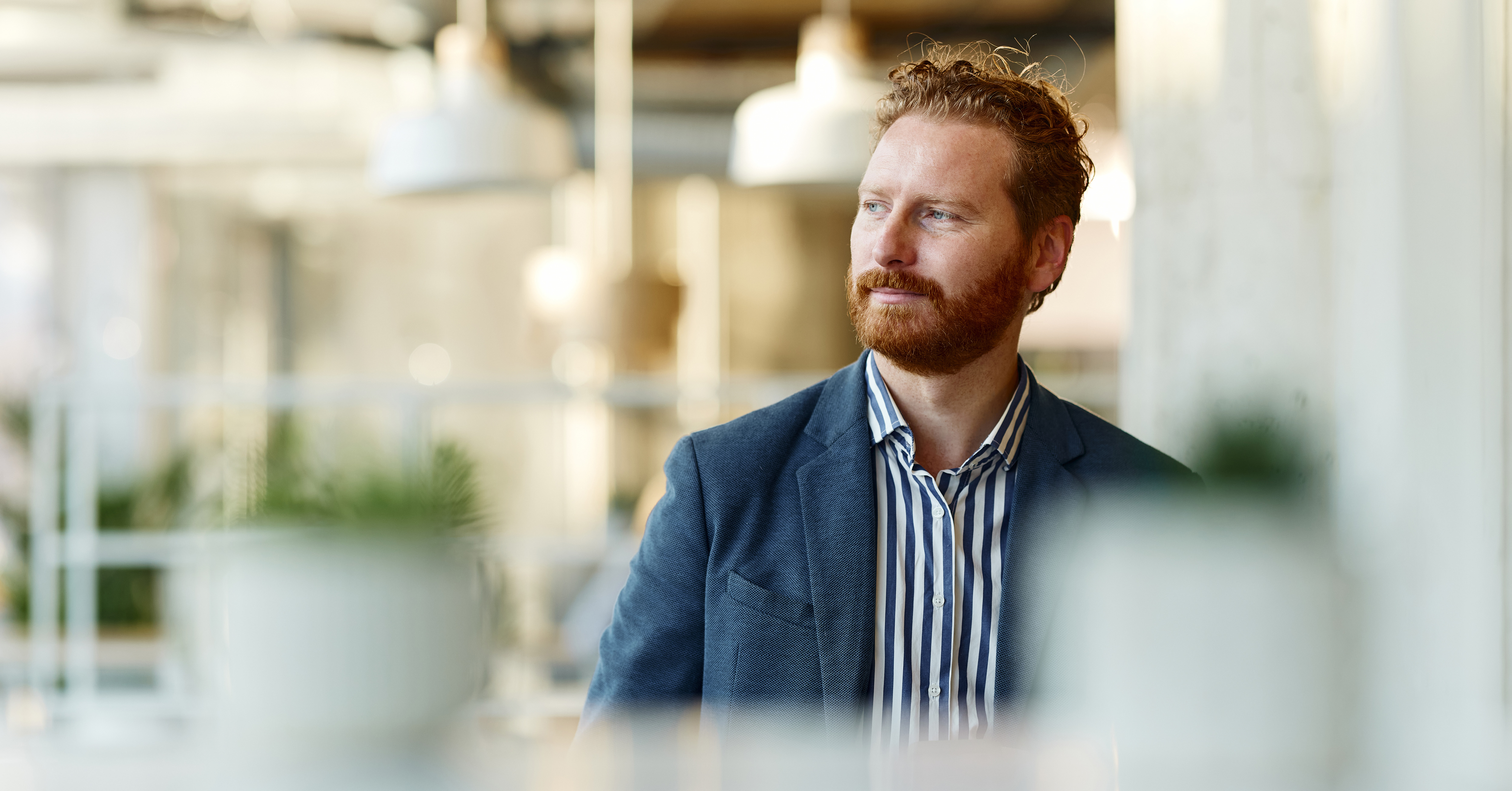 man with beard looking afar