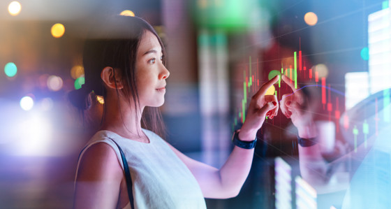 Woman looking at trading screen