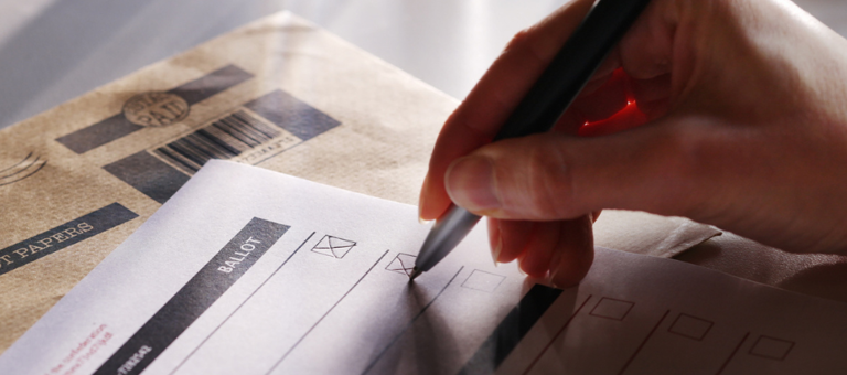 Person filling in a ballot