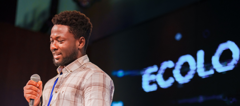 Expert giving a speech at a conference