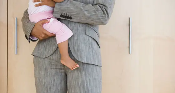 Woman holding a young child