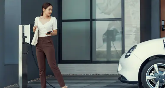woman charging virtual car