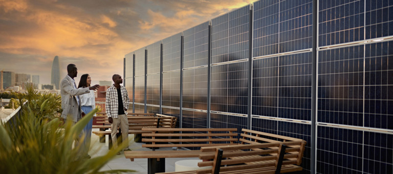 Prospective Buyers Admiring Solar Energy System on a city rooftop