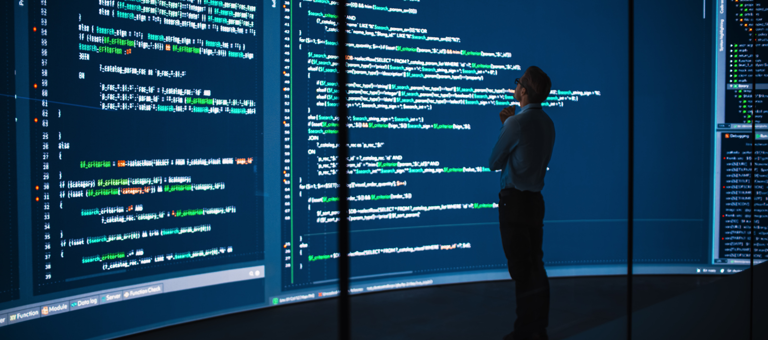 Business man computer screen coding