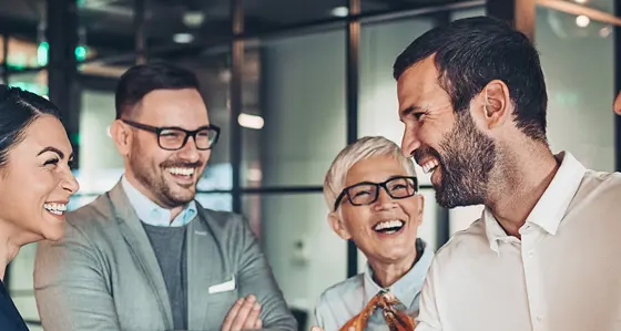 A group of people laughing together