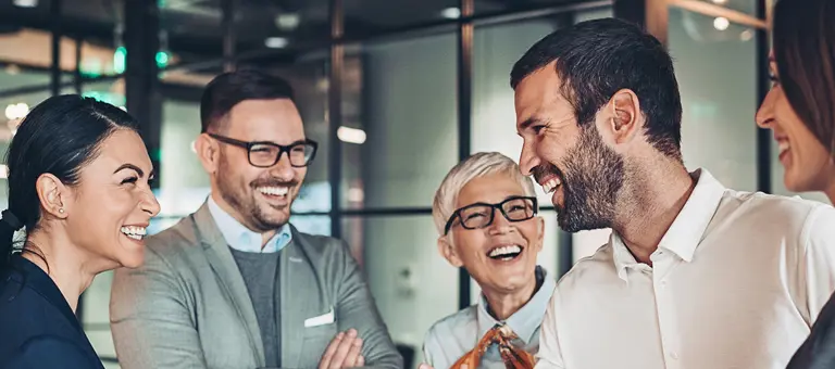 A group of people laughing together