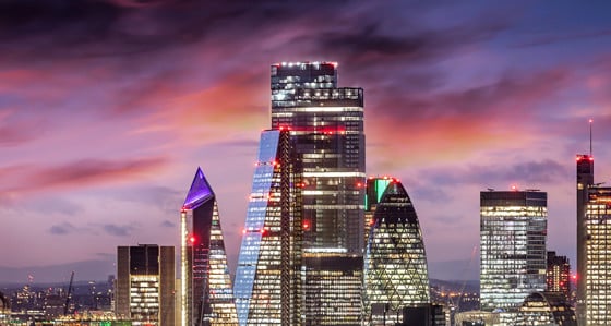 The London business district skyline lit up at dusk