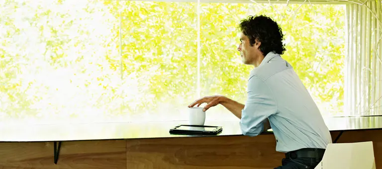 Man looking out of the window