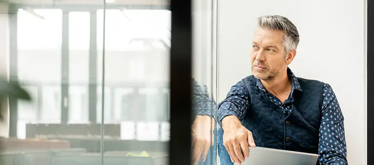 Man sitting at a desk