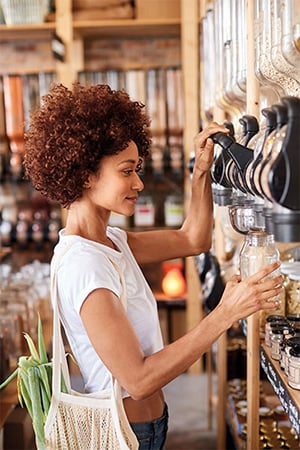 Woman filling up waterbottle png