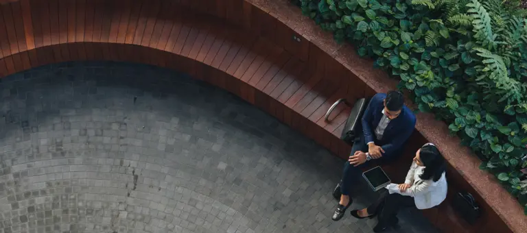 Business people sitting on a bench