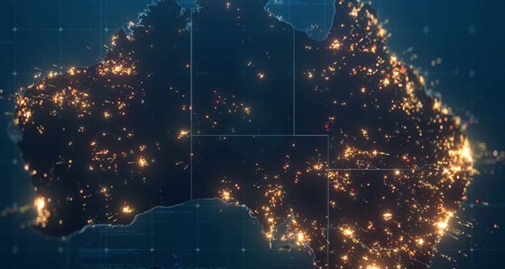 Australia shown from space at night with lights revealing the populated areas