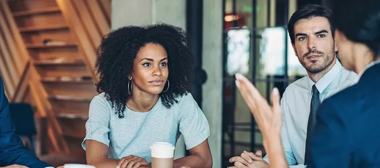A group of people having a conversation