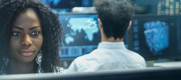 Women reviewing data on a screen