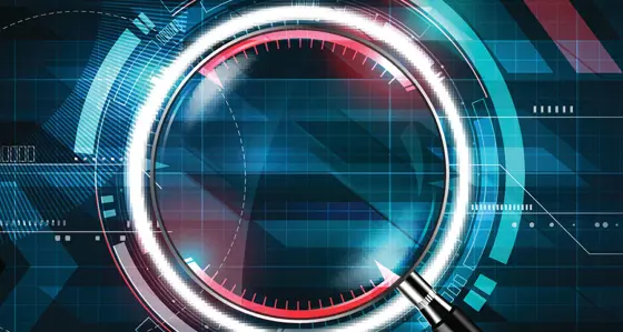 A close-up of a camera lens surrounded by colourful graphics