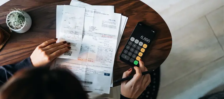 Woman looking at her bills