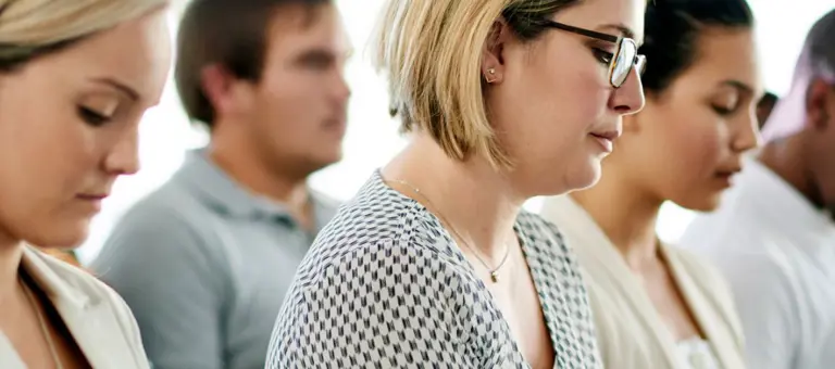 Group of professionals taking notes
