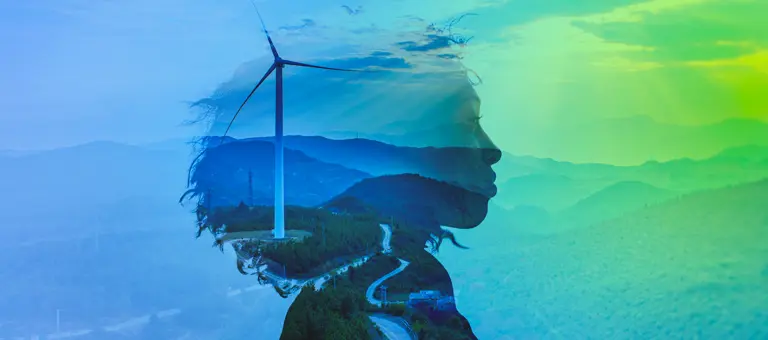 Woman's head overlaid with wind farm landscape