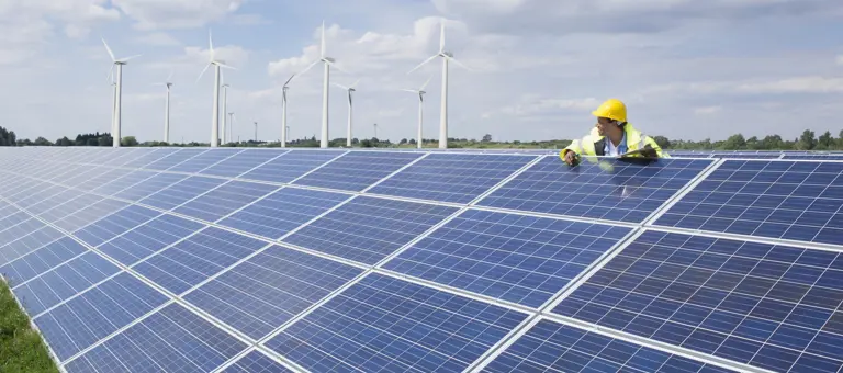 Worker on a solar panel
