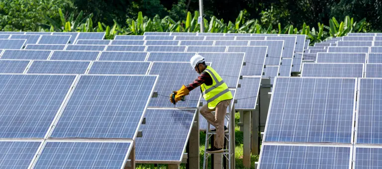 Engineer working on a solar panel