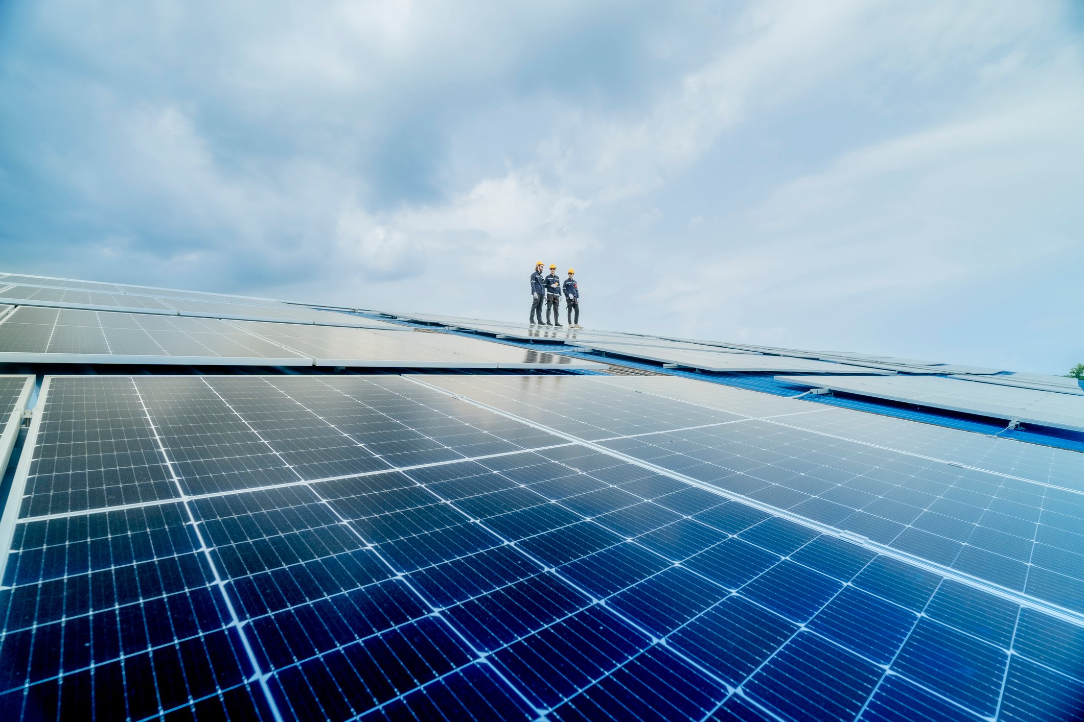 solar workers on solar panels