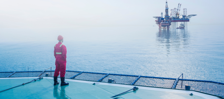 Man standing on oil rig