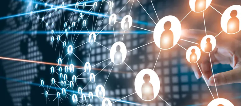 Multiple connected people icons over a digital image of the Earth