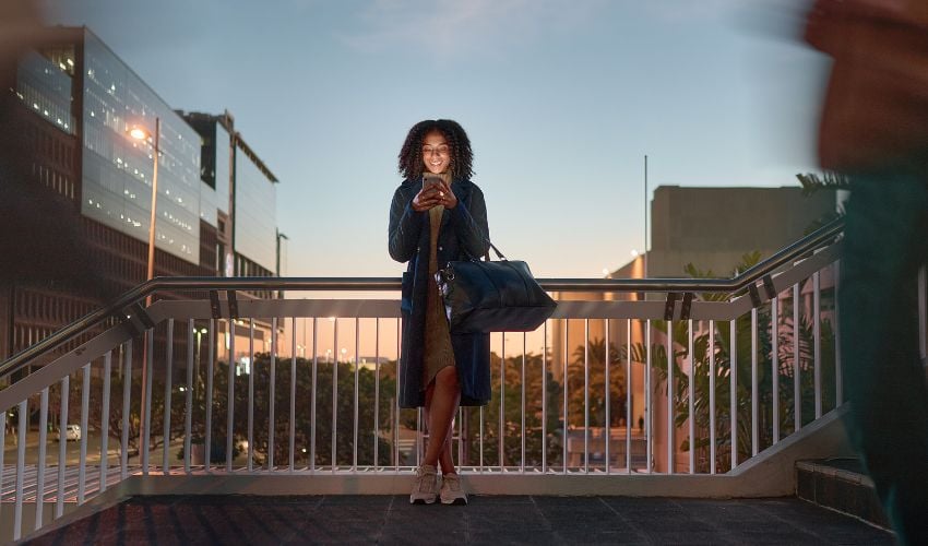 Woman outside on her mobile phone
