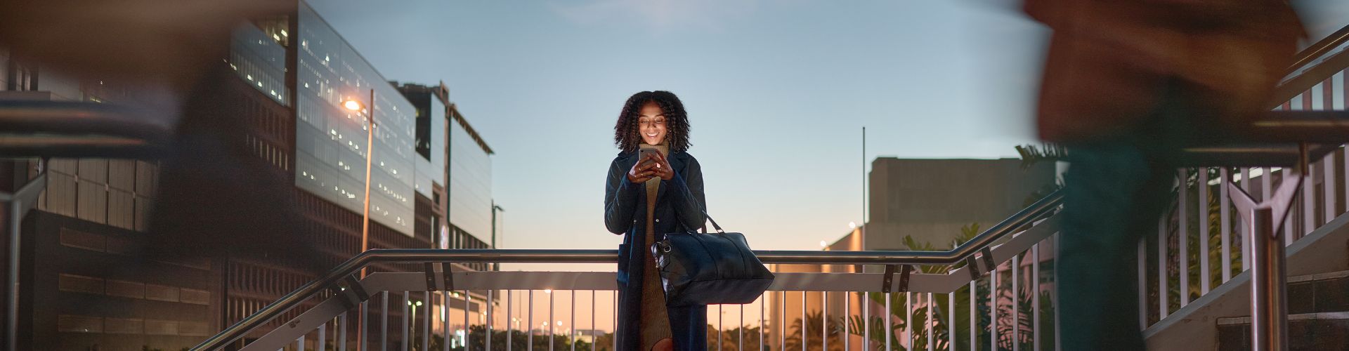 Woman outside on her mobile phone
