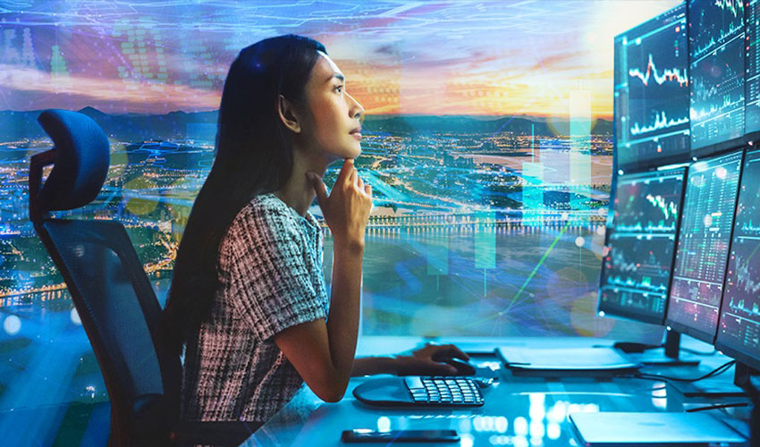 Woman looking at screens