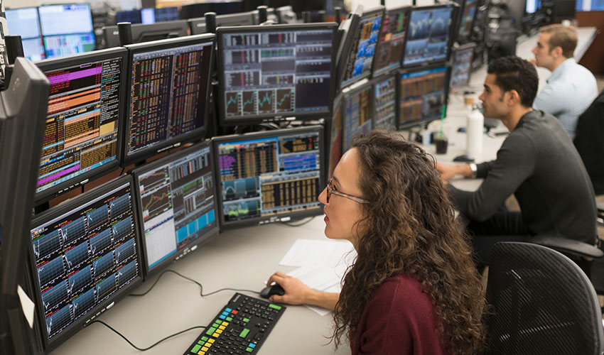 Workers looking at screens