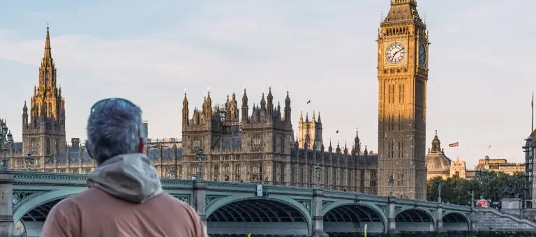 Man in front of Government buildings