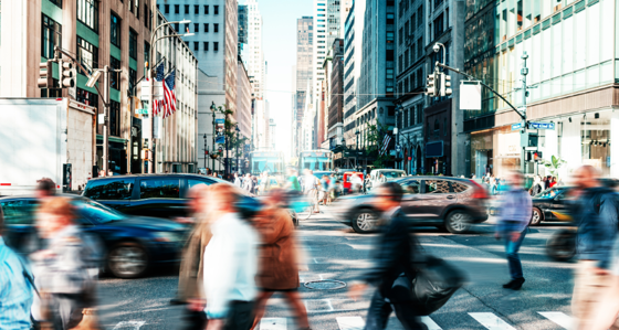 Crowded street with people in New York in springtime