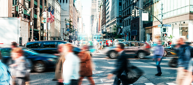 Crowded street with people in New York in springtime