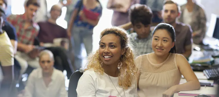 Group of diverse people looking in the same direction