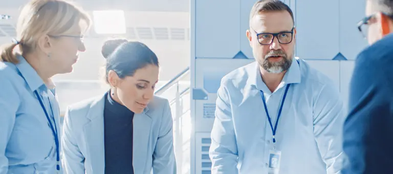 Four work colleagues in a meeting